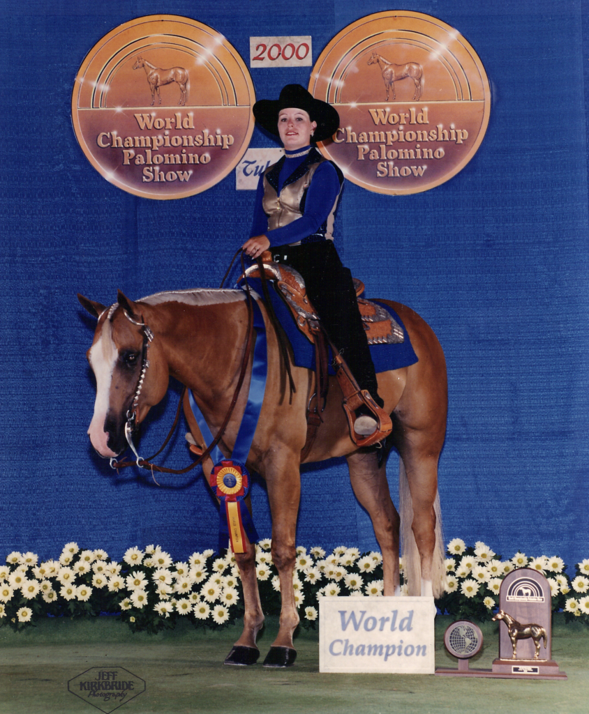 Photo of riding instructor Brandy McDonnell on a world champion horse she trained and exhibited